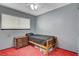 Cozy bedroom featuring a ceiling fan, window, and simple decor at 4678 San Benito St, Las Vegas, NV 89121