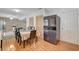 Spacious dining area provides access to multiple rooms and features wood-look flooring at 4678 San Benito St, Las Vegas, NV 89121