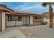 Welcoming single-story home featuring desert landscaping and a covered front porch at 4678 San Benito St, Las Vegas, NV 89121