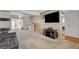 Comfortable living area with media center and easy access to the kitchen and dining room at 4678 San Benito St, Las Vegas, NV 89121