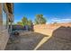 Exterior view of a backyard with a hot tub, offering relaxation and leisure in a private outdoor space at 5024 Stone Bay Ave, Las Vegas, NV 89131