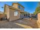 The house boasts a well maintained backyard with a hot tub area with gravel at 5024 Stone Bay Ave, Las Vegas, NV 89131