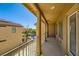 An outdoor balcony featuring great light and railing with view of the neighborhood at 5024 Stone Bay Ave, Las Vegas, NV 89131
