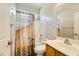 Bathroom with shower, toilet, sink, and light wood cabinetry at 5024 Stone Bay Ave, Las Vegas, NV 89131