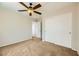 Bedroom includes carpet flooring, closet with sliding doors, and light neutral paint at 5024 Stone Bay Ave, Las Vegas, NV 89131
