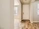 Bright entryway with wood tile flooring and white trim at 5024 Stone Bay Ave, Las Vegas, NV 89131
