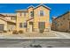 Charming two-story home with desert landscaping and neutral color palette at 5024 Stone Bay Ave, Las Vegas, NV 89131