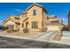 Two story home with a low maintenance front yard and a two car garage at 5024 Stone Bay Ave, Las Vegas, NV 89131