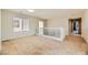 Loft featuring carpet flooring, natural light, and stairs with white railings at 5024 Stone Bay Ave, Las Vegas, NV 89131
