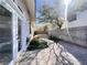 Charming backyard patio area with artificial turf and decorative hardscape at 5263 Shasta Lake Way, Las Vegas, NV 89118