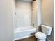 Clean bathroom features tile shower with built-in niche and modern toilet at 5263 Shasta Lake Way, Las Vegas, NV 89118
