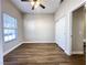Bedroom with wood floors, ceiling fan, and closet space, plus lots of light at 5263 Shasta Lake Way, Las Vegas, NV 89118