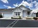 Charming single-story home featuring a two-car garage, white picket fence and landscaped front yard at 5263 Shasta Lake Way, Las Vegas, NV 89118