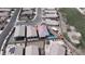 Aerial view of a private home featuring a refreshing pool nestled in a landscaped backyard in a quiet neighborhood at 5555 E San Pietro Dr, Pahrump, NV 89061