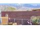 A cozy backyard showcasing a charming mix of landscaping and mountain views, offering a serene outdoor retreat at 5555 E San Pietro Dr, Pahrump, NV 89061