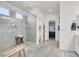Bright bathroom showcasing an open layout with a modern glass shower and convenient access to the vanity at 5555 E San Pietro Dr, Pahrump, NV 89061