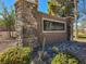 Stone community sign with desert landscaping showcasing the Ventano community at 5555 E San Pietro Dr, Pahrump, NV 89061