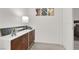 Stylish hallway with decorative cabinet, trendy artwork, and smooth flooring at 5555 E San Pietro Dr, Pahrump, NV 89061