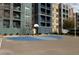 Outdoor basketball court and apartment homes in the background at 56 E Serene Ave # 306, Las Vegas, NV 89123