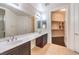 Spacious bathroom with double sinks, lots of counter space, and a walk-in closet at 56 E Serene Ave # 306, Las Vegas, NV 89123