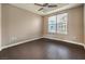Bedroom with ceiling fan, window, carpet, and neutral paint at 56 E Serene Ave # 306, Las Vegas, NV 89123