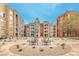 Community courtyard with outdoor seating and landscaping offering a tranquil environment at 56 E Serene Ave # 306, Las Vegas, NV 89123
