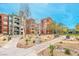 Beautifully landscaped grounds with seating areas and walkways between buildings at 56 E Serene Ave # 306, Las Vegas, NV 89123