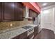 Well-equipped kitchen with granite countertops, stainless steel appliances, and sleek cabinetry at 56 E Serene Ave # 306, Las Vegas, NV 89123