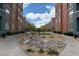 View of the complex highlighting the landscaping and surrounding buildings at 56 E Serene Ave # 306, Las Vegas, NV 89123