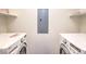Functional laundry room with modern, front-loading washer and dryer units at 56 E Serene Ave # 306, Las Vegas, NV 89123
