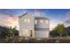 Charming two-story home featuring a modern farmhouse design, two-car garage, and desert landscaping at 5912 Topaz Ledge Ct, Las Vegas, NV 89131