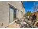 Enjoy outdoor living on this cozy patio with barbecue and stylish furniture at 5916 Sierra Cliff St, North Las Vegas, NV 89031
