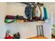 Well-organized closet with shelves, hanging clothes, and shoe storage at 5916 Sierra Cliff St, North Las Vegas, NV 89031