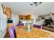 Dining room provides a view of the adjacent open kitchen at 5916 Sierra Cliff St, North Las Vegas, NV 89031