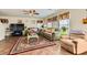 Comfortable living room featuring tile flooring, ample seating, and plenty of natural light at 5916 Sierra Cliff St, North Las Vegas, NV 89031
