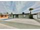 Charming front exterior with gravel yard and desert landscaping at 604 N Minnesota St, Las Vegas, NV 89107