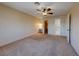 Spacious bedroom features a ceiling fan, vanity, closet and ensuite at 637 Del Prado Dr, Boulder City, NV 89005