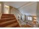 Carpeted staircase and railing lead to the upper level at 637 Del Prado Dr, Boulder City, NV 89005