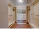 Walk-in closet with custom shelving and drawers for organized storage at 637 Del Prado Dr, Boulder City, NV 89005