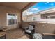 Inviting outdoor balcony featuring stylish seating and scenic views at 6809 Cobre Azul # 201, Las Vegas, NV 89108