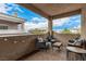 Inviting outdoor balcony featuring stylish seating and scenic views at 6809 Cobre Azul # 201, Las Vegas, NV 89108