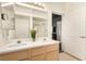 Bright bathroom features dual sinks and a large mirror at 6809 Cobre Azul # 201, Las Vegas, NV 89108