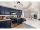 Kitchen features updated countertops, stainless steel appliances, and recessed lighting at 6809 Cobre Azul # 201, Las Vegas, NV 89108