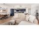 Cozy living room connecting to an eat-in kitchen, complete with a large sectional sofa at 6809 Cobre Azul # 201, Las Vegas, NV 89108