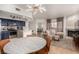 Open floor plan featuring kitchen, dining area, and living room with fireplace at 6809 Cobre Azul # 201, Las Vegas, NV 89108