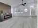 Bright living area with modern electric fireplace and vaulted ceilings at 7413 Turtle Dove Ct, Las Vegas, NV 89129
