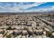 Panoramic view of a neighborhood, showcasing the community layout against a backdrop of distant mountains at 7820 Esteem St, Las Vegas, NV 89131
