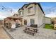 This backyard features a patio, gazebo with seating, and ample space for outdoor activities at 7828 Stone Forest St, North Las Vegas, NV 89084