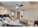 Open living room with wood flooring, recessed lights, and comfortable sofa at 7828 Stone Forest St, North Las Vegas, NV 89084