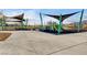 A vibrant playground with modern equipment and shade structures for children to enjoy at 7828 Stone Forest St, North Las Vegas, NV 89084
